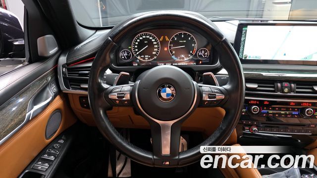 BMW X6 (F16) M50d 2015 — фото 17
