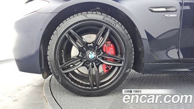 BMW 5 Series (F10) 550i xDrive 2013 — фото 5