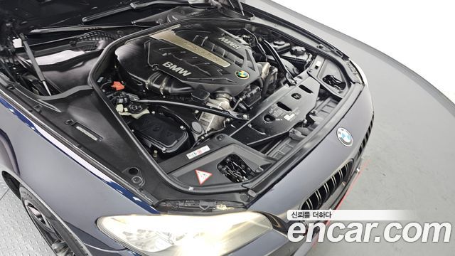 BMW 5 Series (F10) 550i xDrive 2013 — фото 6