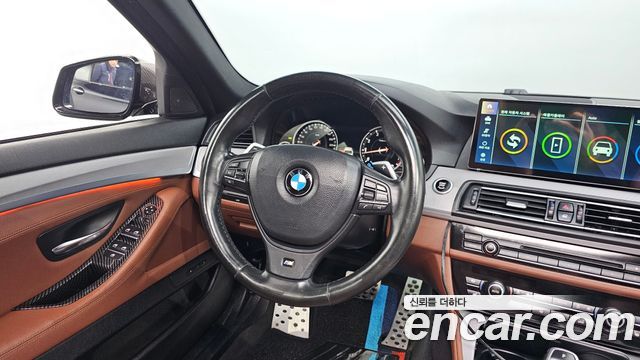 BMW 5 Series (F10) 550i xDrive 2013 — фото 17