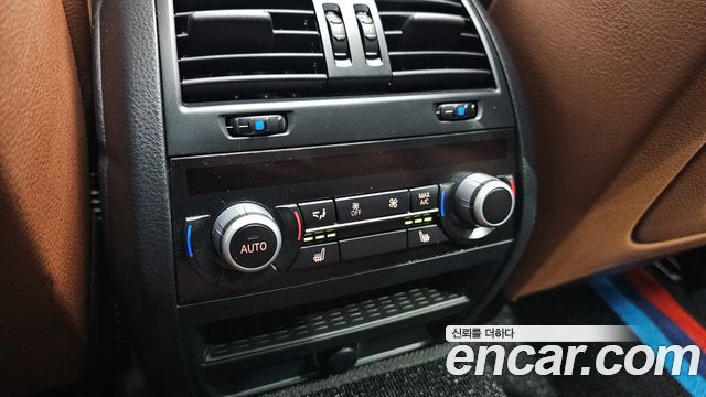 BMW 5 Series (F10) 550i xDrive 2013 — фото 24