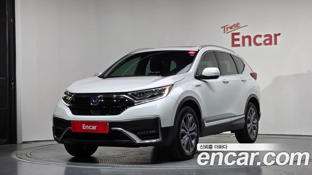 Honda CR-V (V) 2.0 Hybrid Touring 4WD 2022 — фото 1