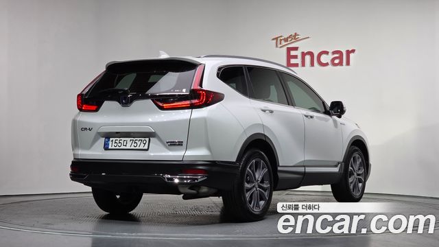Honda CR-V (V) 2.0 Hybrid Touring 4WD 2022 — фото 2
