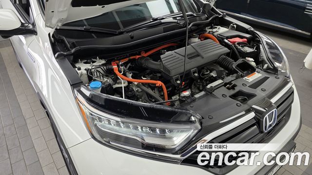 Honda CR-V (V) 2.0 Hybrid Touring 4WD 2022 — фото 6