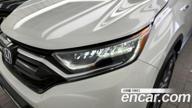 Honda CR-V (V) 2.0 Hybrid Touring 4WD 2022 — фото 22