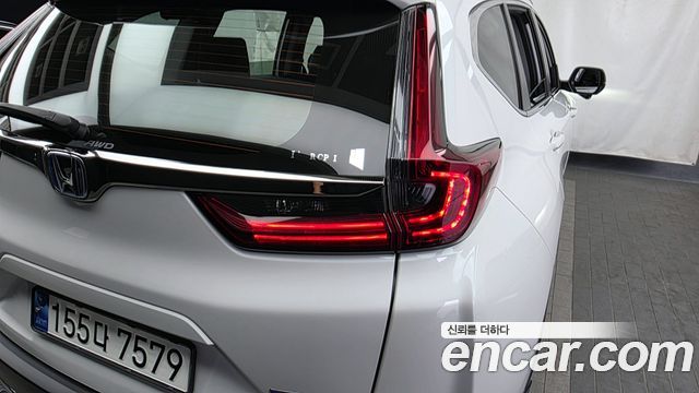 Honda CR-V (V) 2.0 Hybrid Touring 4WD 2022 — фото 23