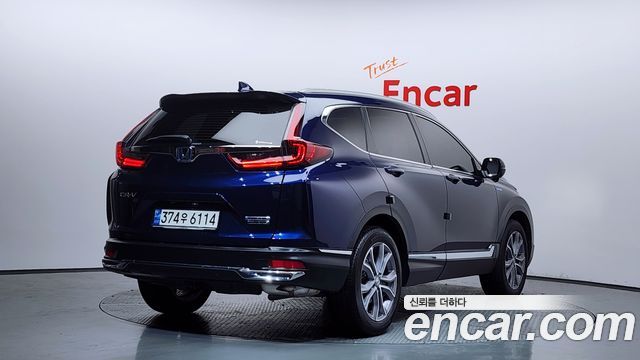 Honda CR-V (V) 2.0 Hybrid Touring 4WD 2022 — фото 2