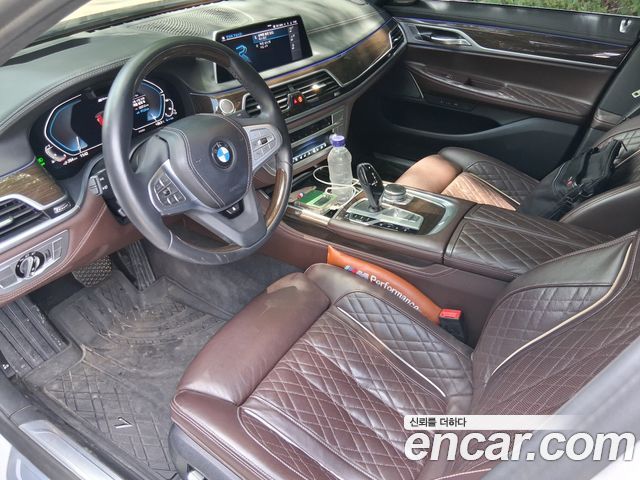 BMW 7 Series (G11) 745e iPerformance Design Pure Excellence 2021 — фото 19