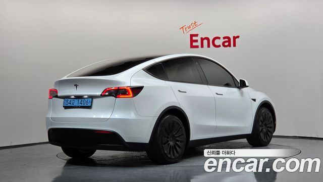 Tesla Model Y RWD 2024 — фото 2