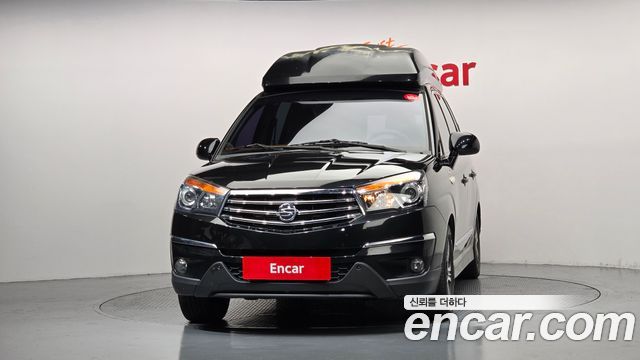 KG Mobility (SsangYong) Korando Turismo 4WD Chateau 11-seater 2015 — фото 3