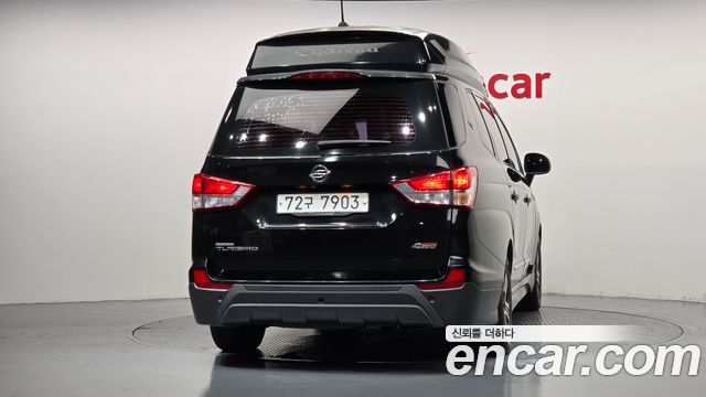 KG Mobility (SsangYong) Korando Turismo 4WD Chateau 11-seater 2015 — фото 4