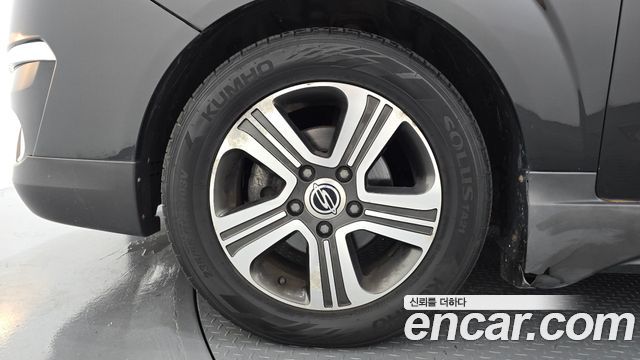 KG Mobility (SsangYong) Korando Turismo 4WD Chateau 11-seater 2015 — фото 5