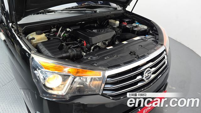 KG Mobility (SsangYong) Korando Turismo 4WD Chateau 11-seater 2015 — фото 6