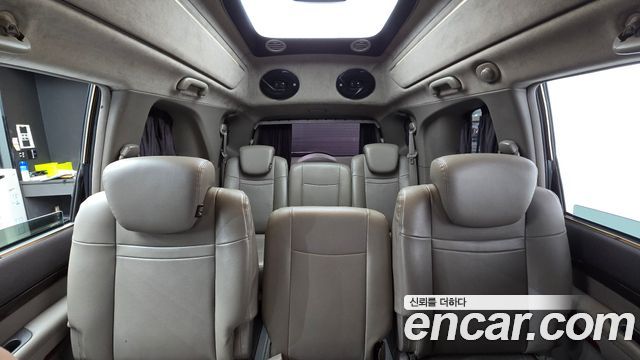 KG Mobility (SsangYong) Korando Turismo 4WD Chateau 11-seater 2015 — фото 15