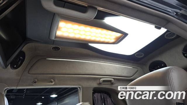KG Mobility (SsangYong) Korando Turismo 4WD Chateau 11-seater 2015 — фото 24