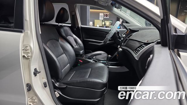 KG Mobility (SsangYong) Korando C 2.0 CVT 2WD Deluxe 2014 — фото 11