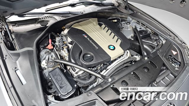 BMW 5 Series (F10) M550d xDrive 2014 — фото 6
