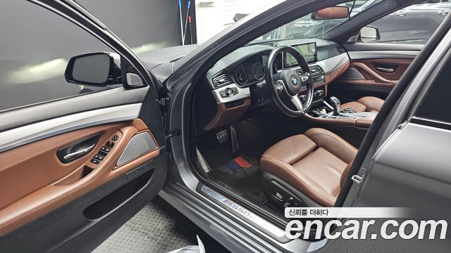 BMW 5 Series (F10) M550d xDrive 2014 — фото 10