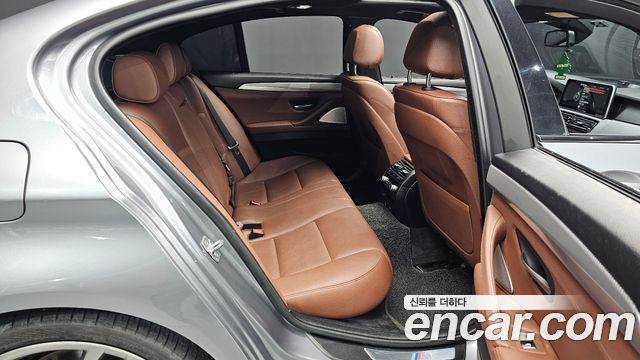 BMW 5 Series (F10) M550d xDrive 2014 — фото 11