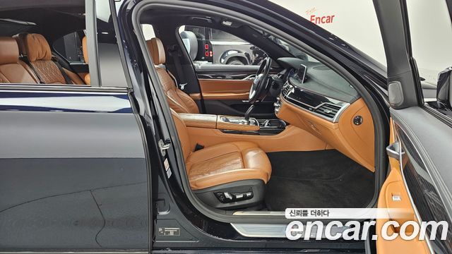 BMW 7 Series (G11) 740d xDrive M Sport 2018 — фото 11
