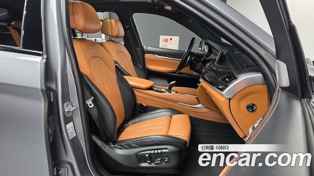 BMW X6 (F16) M50d 2018 — фото 11