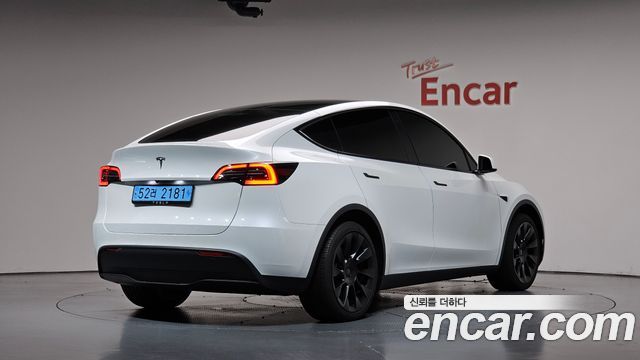 Tesla Model Y RWD 2024 — фото 2