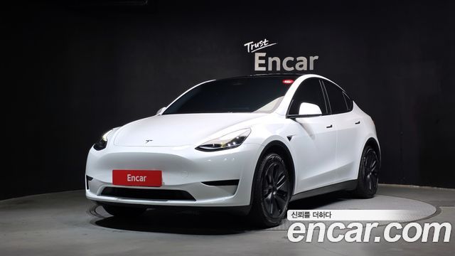 Tesla Model Y RWD 2024 — фото 1