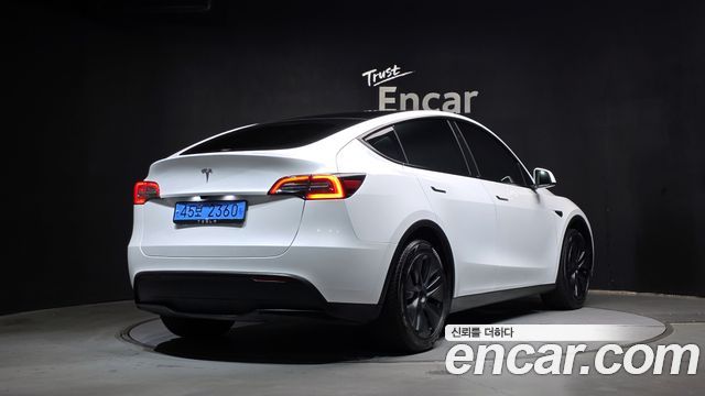 Tesla Model Y RWD 2024 — фото 2