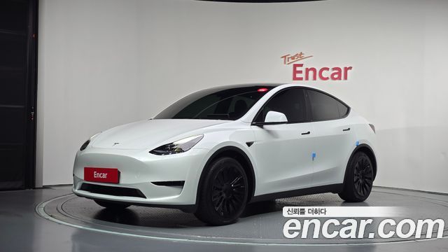 Tesla Model Y RWD 2024 — фото 1