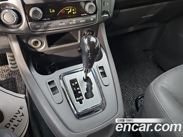 KG Mobility (SsangYong) Korando Turismo 4WD TX 9-seater 2016 — фото 8
