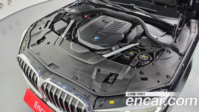 BMW 7 Series (G11) 740Li xDrive Design Pure Excellence 2022 — фото 6