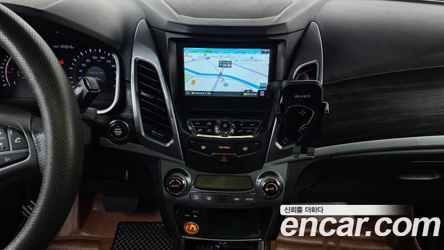 KG Mobility (SsangYong) Korando C 2.0 CVT 2WD Deluxe 2015 — фото 12