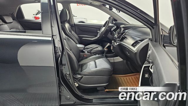 KG Mobility (SsangYong) Korando C 2.0 CVT 2WD Deluxe 2015 — фото 26