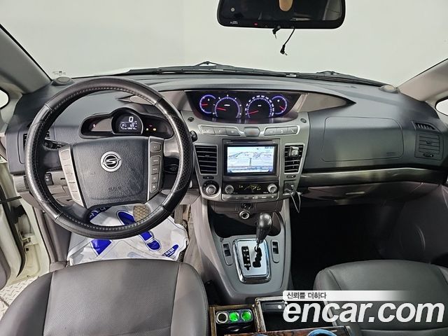 KG Mobility (SsangYong) Korando Turismo 4WD GT 11-seater 2014 — фото 5