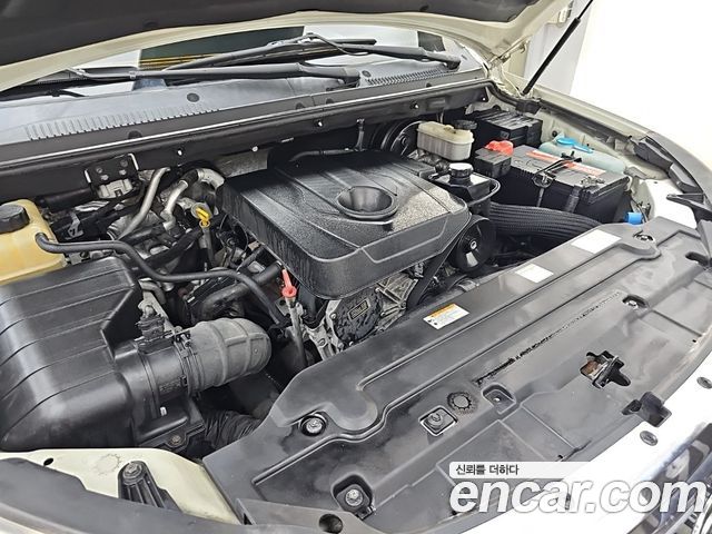 KG Mobility (SsangYong) Korando Turismo 4WD GT 11-seater 2014 — фото 6