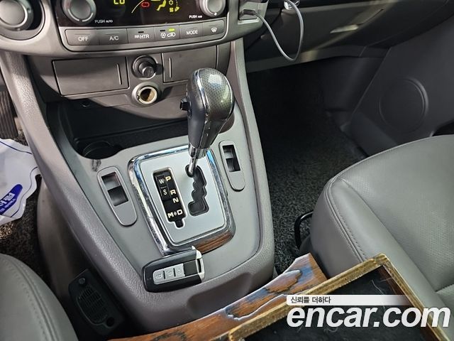KG Mobility (SsangYong) Korando Turismo 4WD GT 11-seater 2014 — фото 7