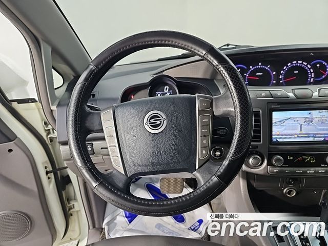 KG Mobility (SsangYong) Korando Turismo 4WD GT 11-seater 2014 — фото 8
