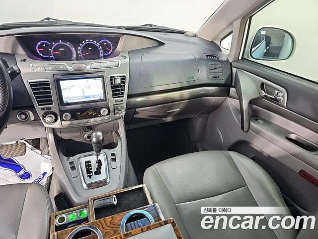 KG Mobility (SsangYong) Korando Turismo 4WD GT 11-seater 2014 — фото 9