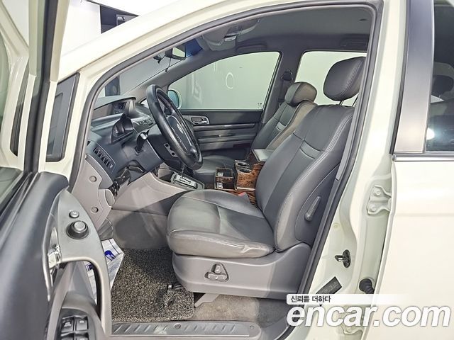 KG Mobility (SsangYong) Korando Turismo 4WD GT 11-seater 2014 — фото 10