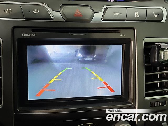 KG Mobility (SsangYong) Korando Turismo 4WD GT 11-seater 2014 — фото 18