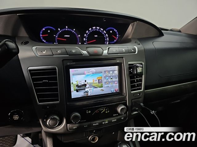 KG Mobility (SsangYong) Korando Turismo 4WD GT 11-seater 2014 — фото 20