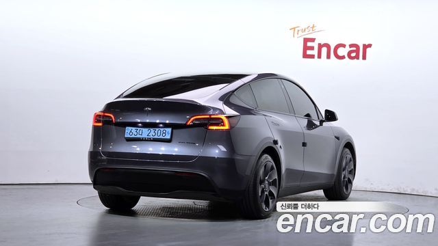 Tesla Model Y RWD 2024 — фото 2