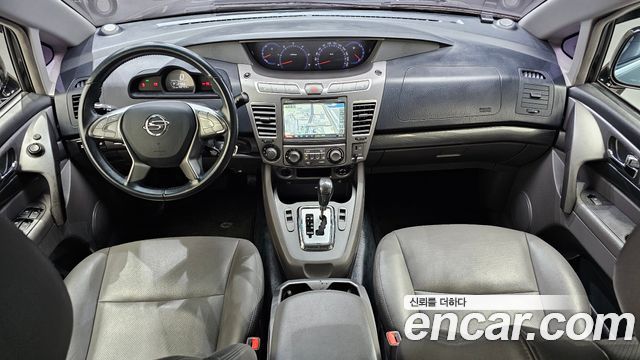 KG Mobility (SsangYong) Korando Turismo 4WD LT 11-seater 2015 — фото 7