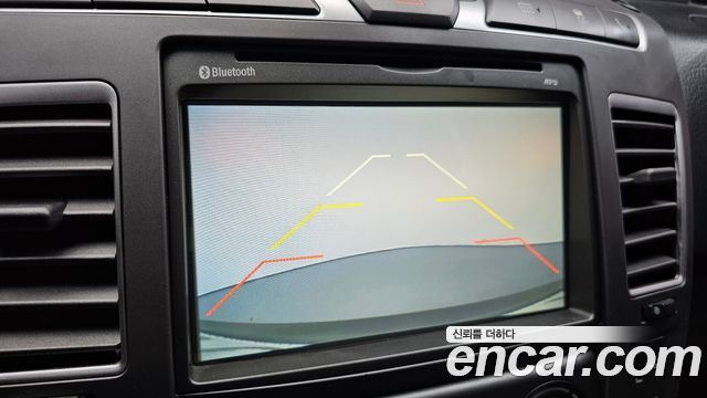 KG Mobility (SsangYong) Korando Turismo 4WD LT 11-seater 2015 — фото 17