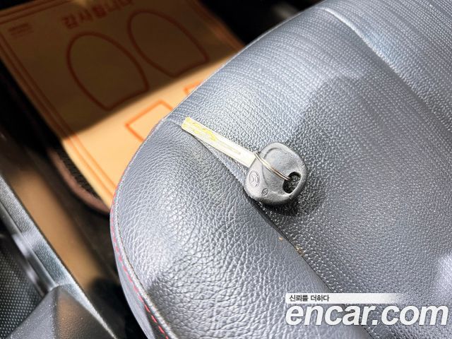 Kia Carens LPI 2.0 GLX High-Deluxe 2011 — фото 19