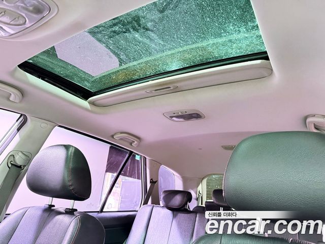 Kia Carens LPI 2.0 GLX High-Deluxe 2011 — фото 21