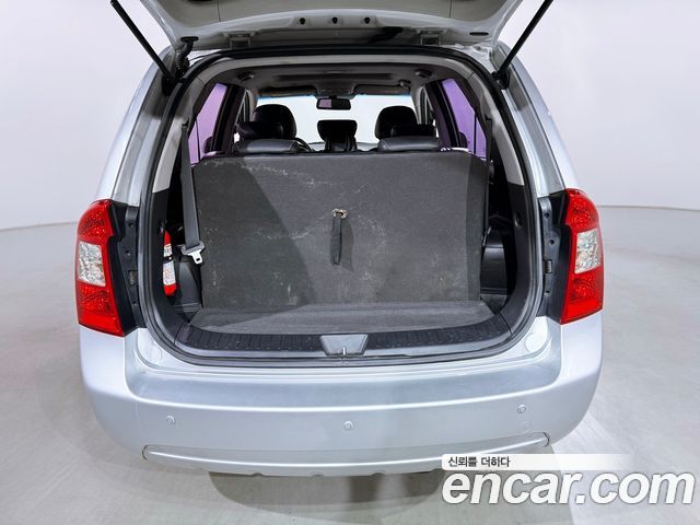 Kia Carens LPI 2.0 GLX High-Deluxe 2011 — фото 23