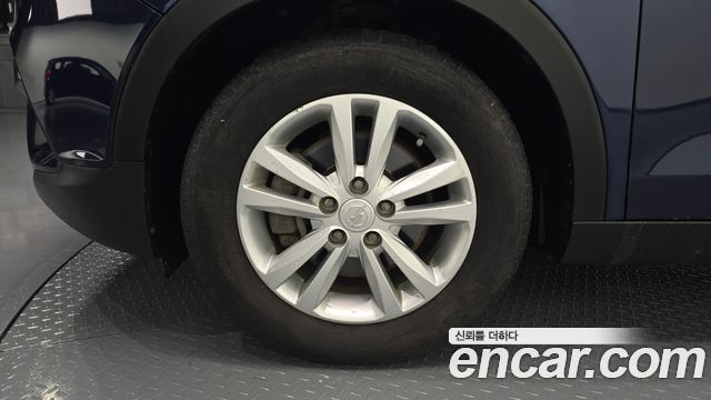 KG Mobility (SsangYong) Tivoli VX 2WD 2015 — фото 5