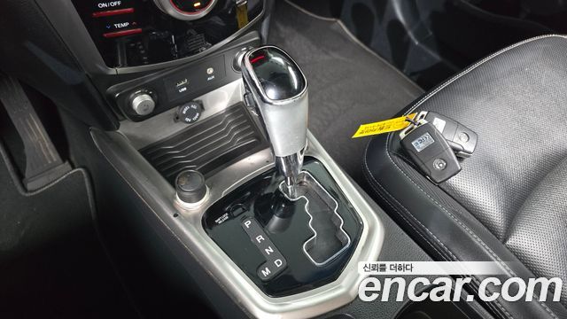 KG Mobility (SsangYong) Tivoli VX 2WD 2015 — фото 9