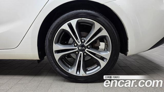 Kia K3 Noblesse 2013 — фото 21